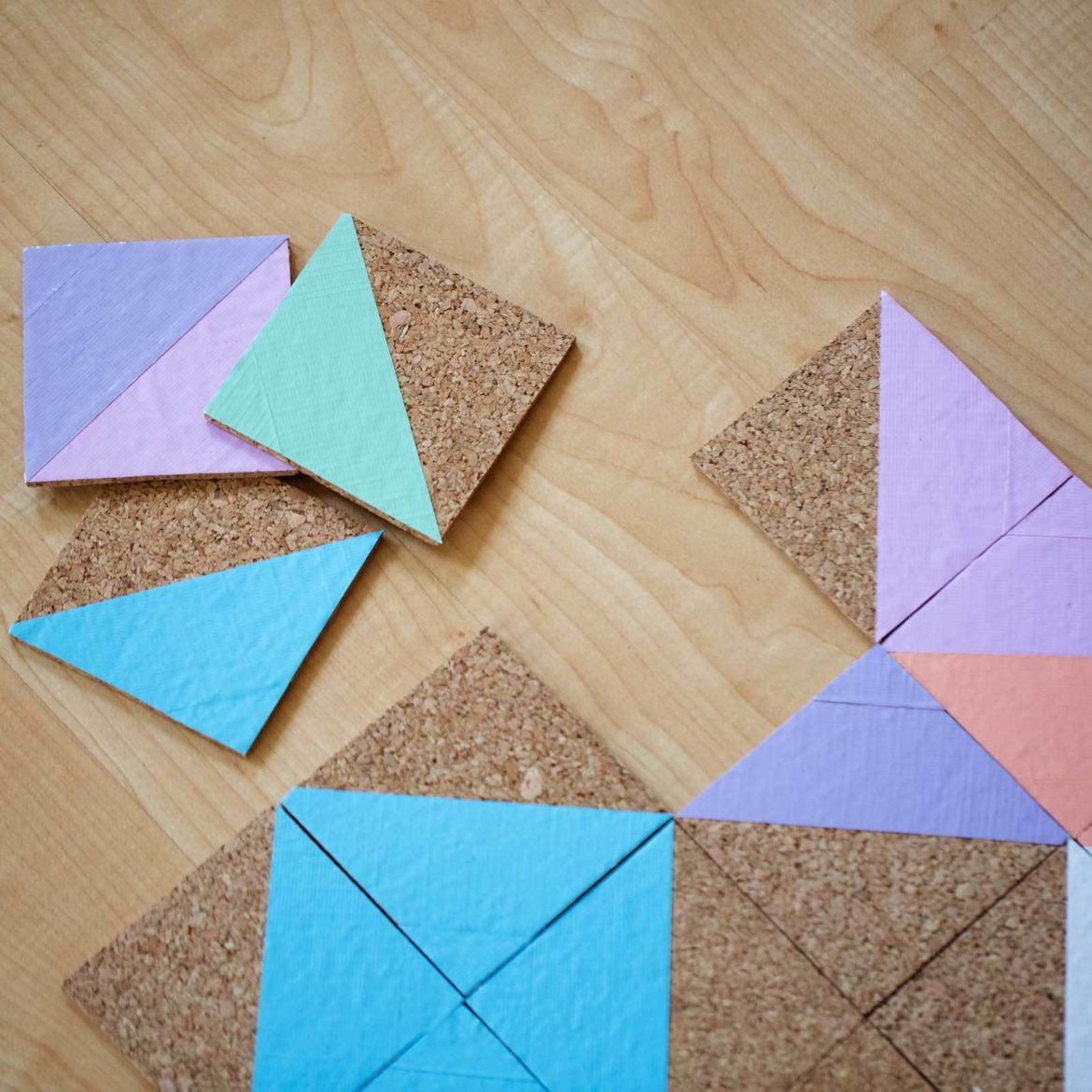 Make a puzzle with cork and Duck Tape
