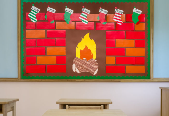Fireplace bulletin board made from Duck Tape in school room