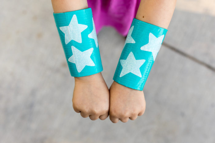 TP wrist cuffs with stars on them.