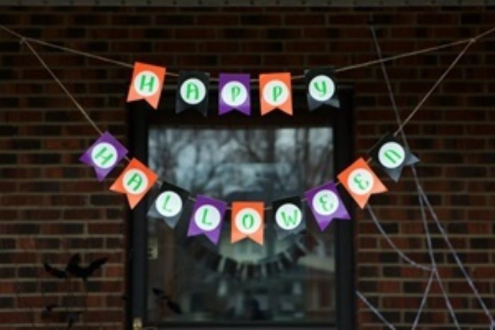 A banner made of Duck Tape that says Happy Halloween