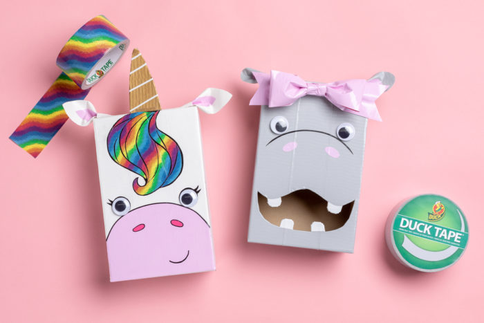 A unicorn Valentine's day card box and a hippo card box.