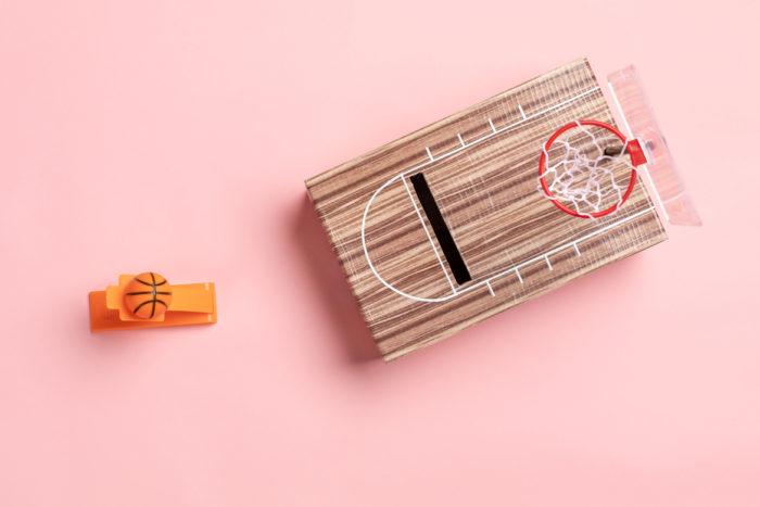 A Valentine's Day card box, decorated as a basketball court and hoop