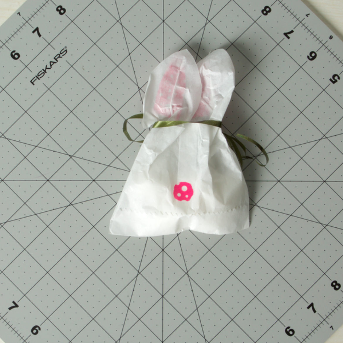 washi circle from stet 3 attached to the back of the bag to serve as a tail