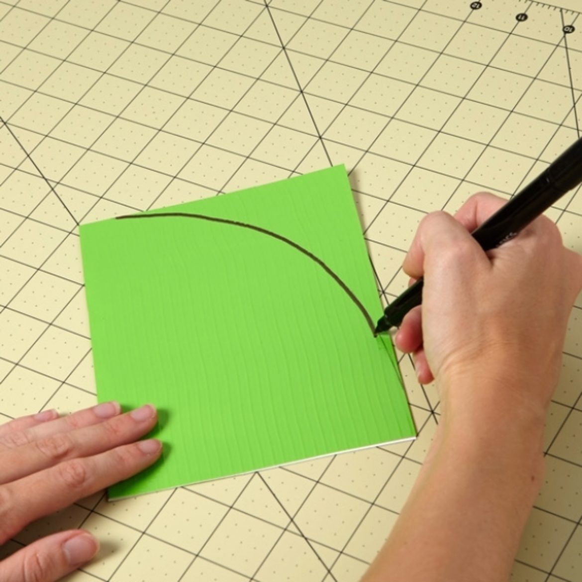 Curve being drawn on folded Duck Tape fabric