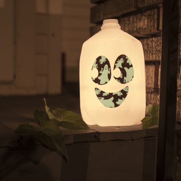 Completed Glow-in-the-Dark Duck Tape® Milk Jug Lantern with a small led light placed inside