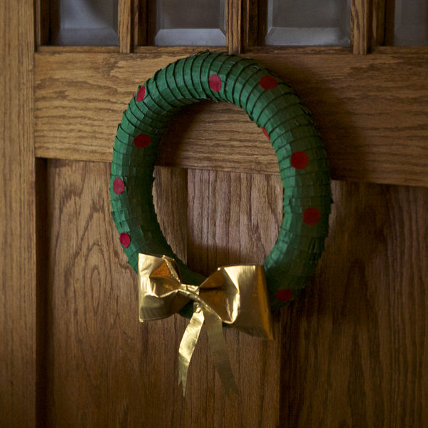 Completed  Duck Tape® Holiday Wreath hanging on a door