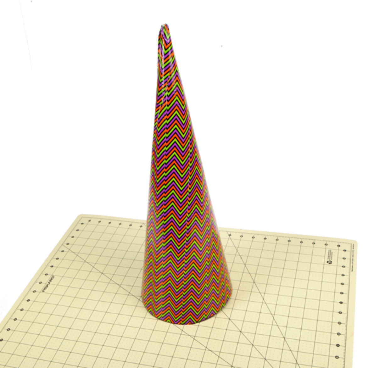 Form the poster board from previous step into a cone shape and secure with Duck Tape
