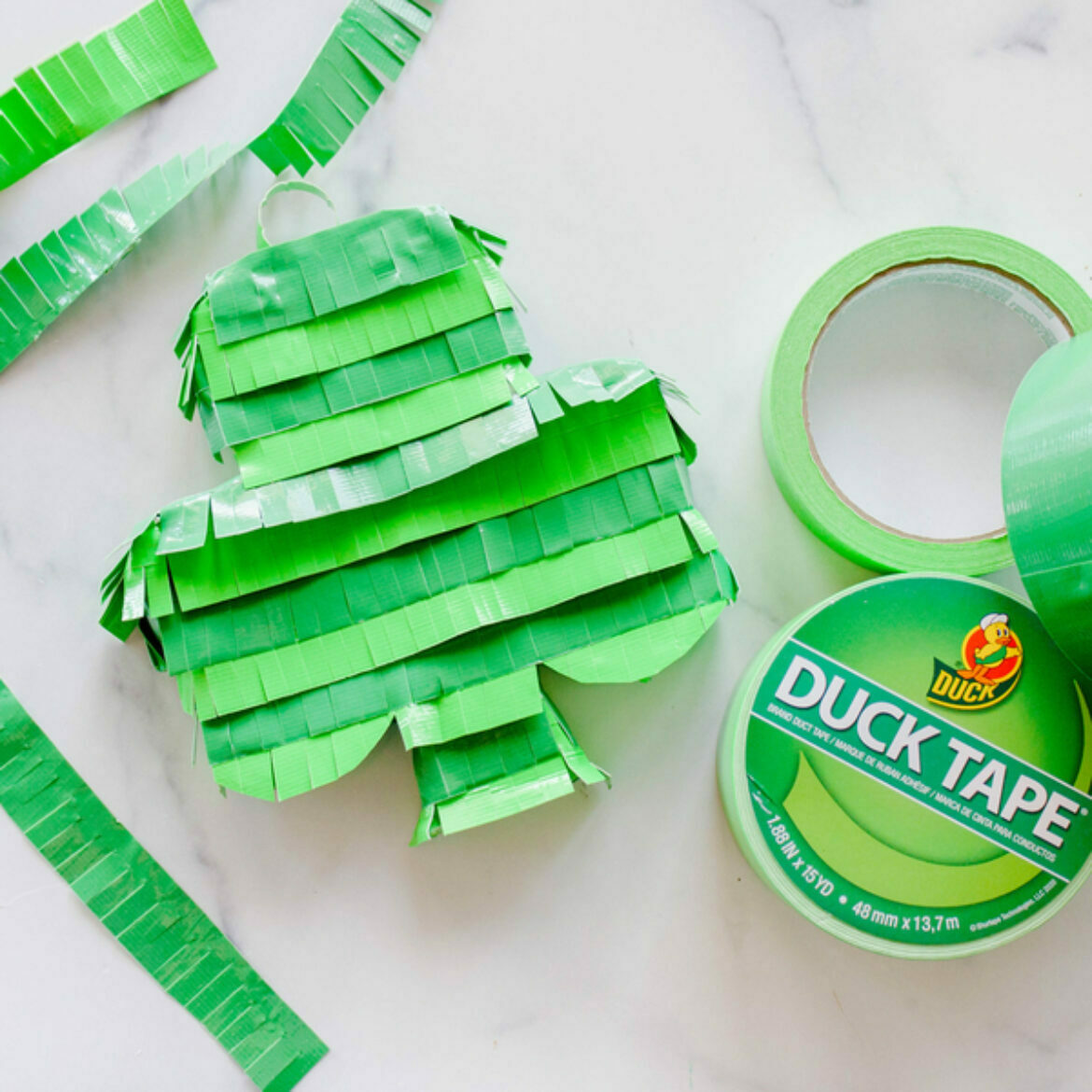 Shamrock shaped green piñata made with Duck tape.