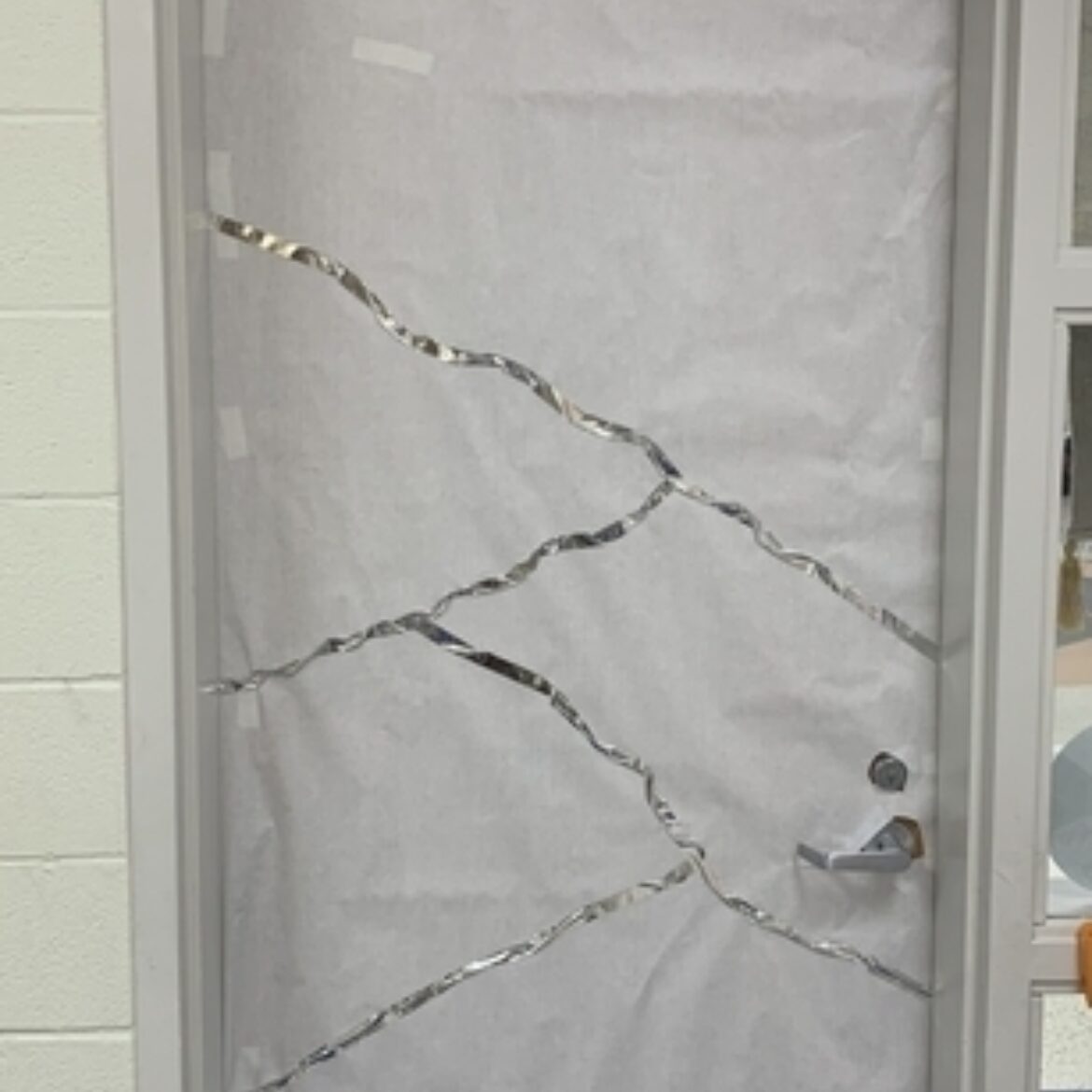 Classroom door with white paper and silver lines to look like mountain tops