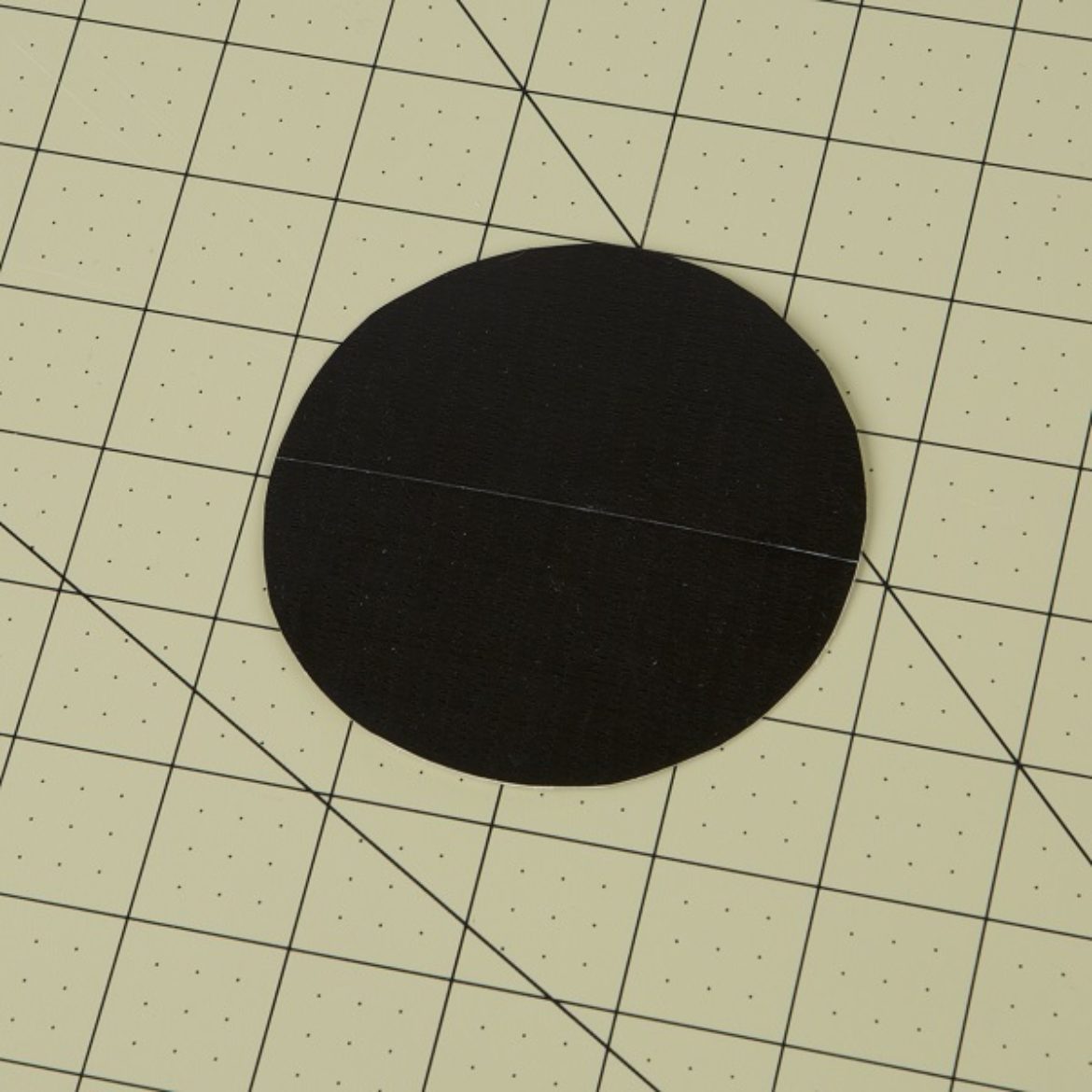 circle from the previous step covered in black Duck Tape