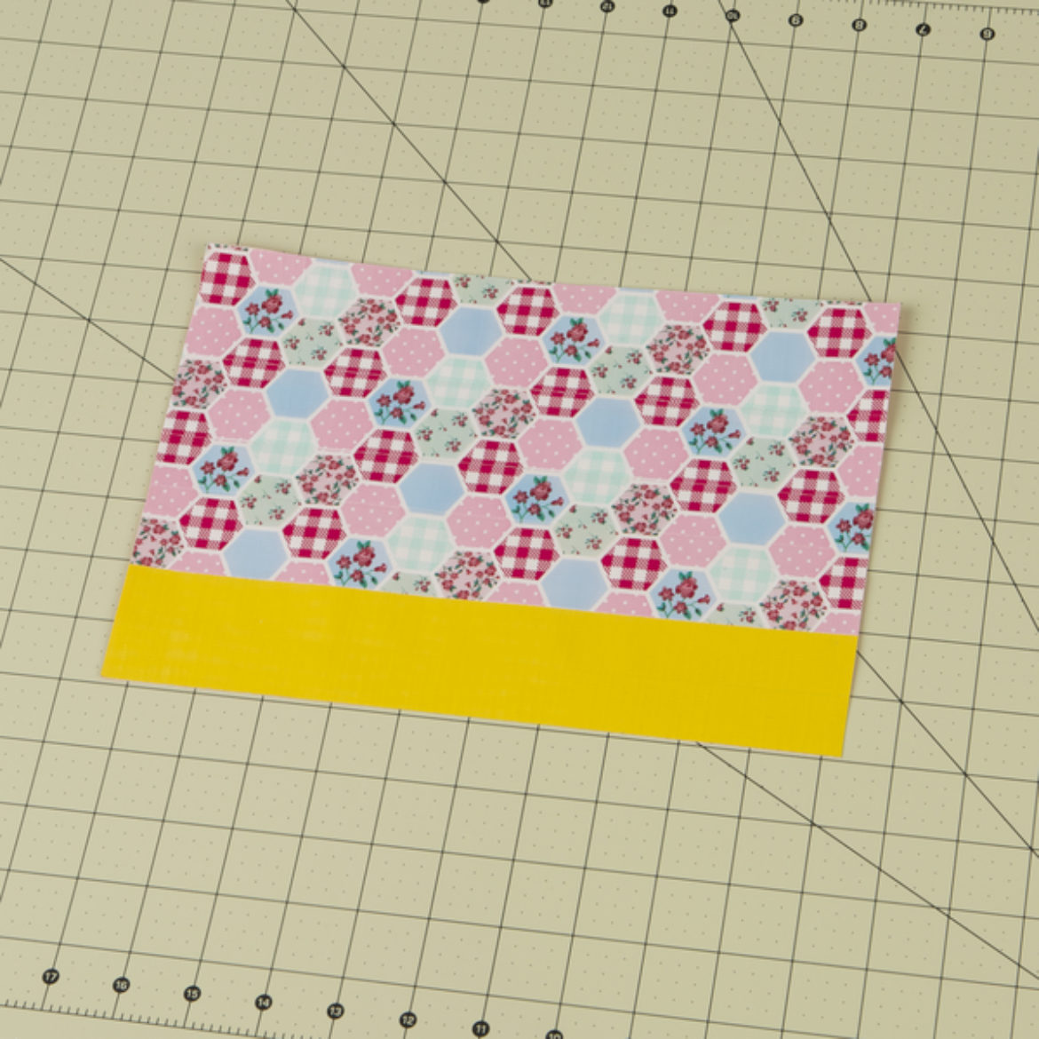 Duck Tape fabric with a strip of yellow Duck Tape at the bottom