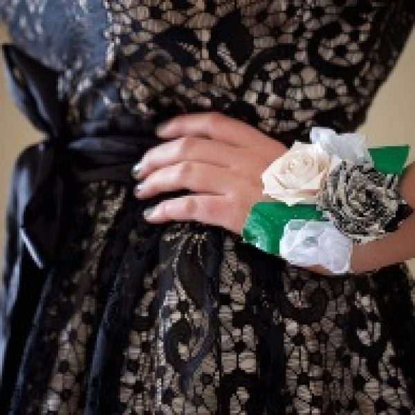 Finished Duck Tape corsage being worn by a young lady in a dress