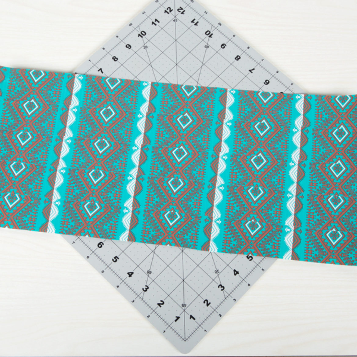 Double sided Duck Tape fabric made by overlapping strips of Duck Tape into a sheet and placing sticky side to sticky side with an identical sheet